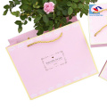 custom pink gold color baby's clothing set paper packaging bag